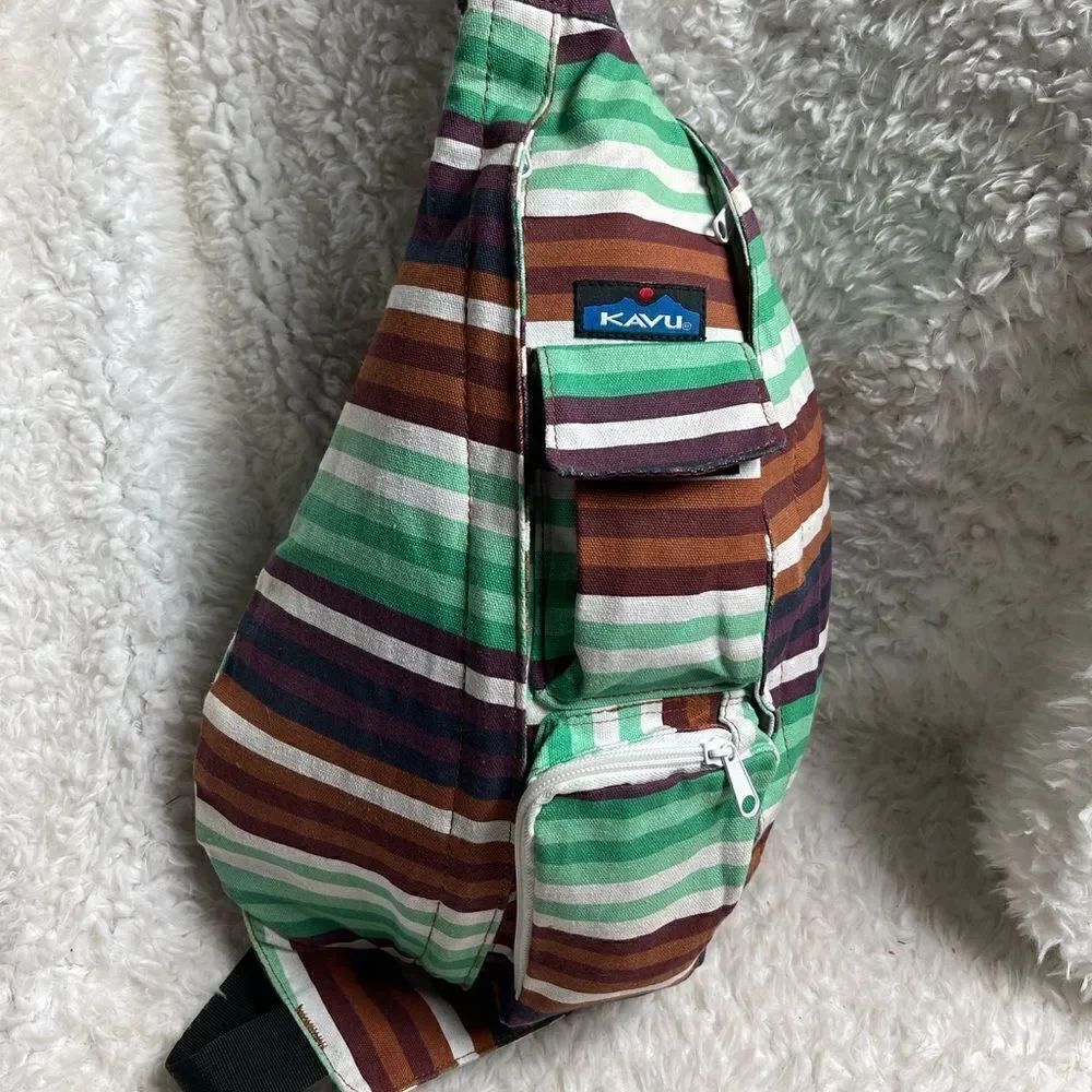 Kavu Rope sling back/ crossbody bag Canvas stripes Aztec color padded back .